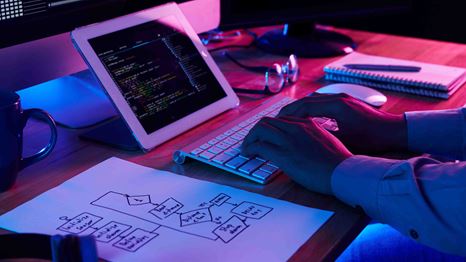 <a href="https://www.freepik.com/free-photo/close-up-image-programer-working-his-desk-office_5698344.htm#fromView=search&page=1&position=5&uuid=1a0b3fa5-1468-4896-b355-abb3aacce33a&query=coding">Image by pressfoto on Freepik</a>