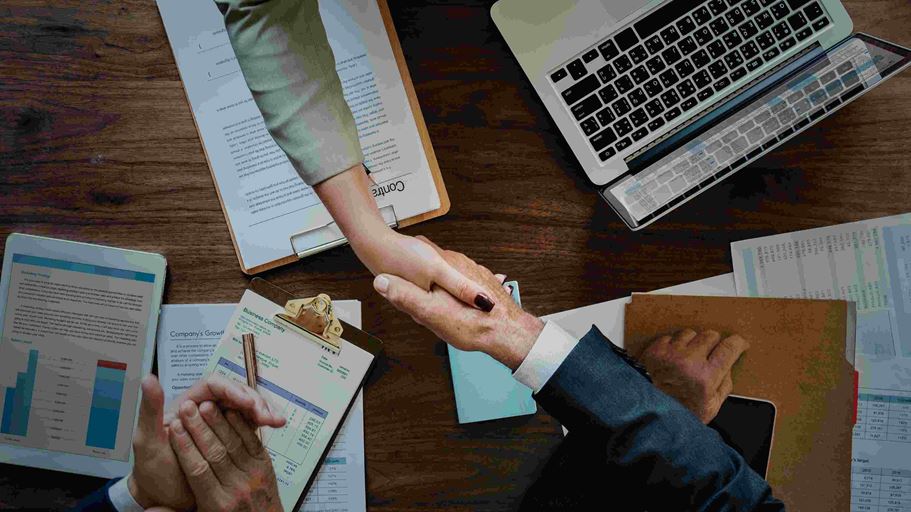 <a href="https://www.magnific.com/free-photo/business-people-shaking-hands-together_2767789.htm">Image by rawpixel.com on Magnific</a>