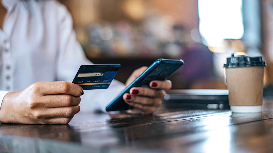 <a href="https://www.freepik.com/free-photo/pay-goods-by-credit-card-through-smartphone-coffee-shop_5598712.htm">Image by jcomp on Freepik</a>